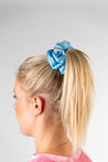 Blonde girl wearing a Cira Nutrition Blue Scrunchie
